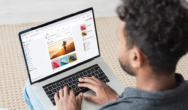 A person looking at social ads on their laptop